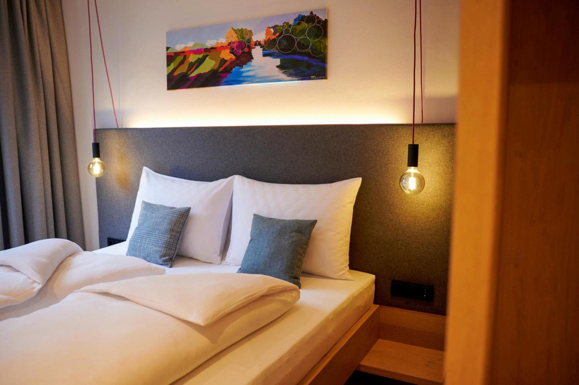 Wellness Und Brunch Morgenzeit Beheizter Naturpool Mit Sandstrand Genuss Fruehstueck Bis 13 Uhr Hochkoenig Sommercard Hotel Maria Alm am Steinernen Meer