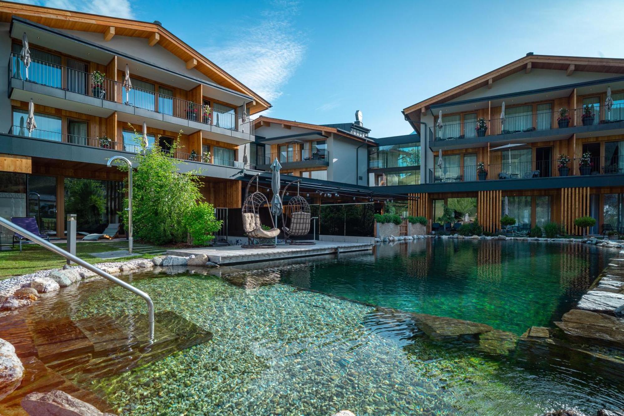 Wellness Und Brunch Morgenzeit Beheizter Naturpool Mit Sandstrand Genuss Fruehstueck Bis 13 Uhr Hochkoenig Sommercard Hotel 3*
