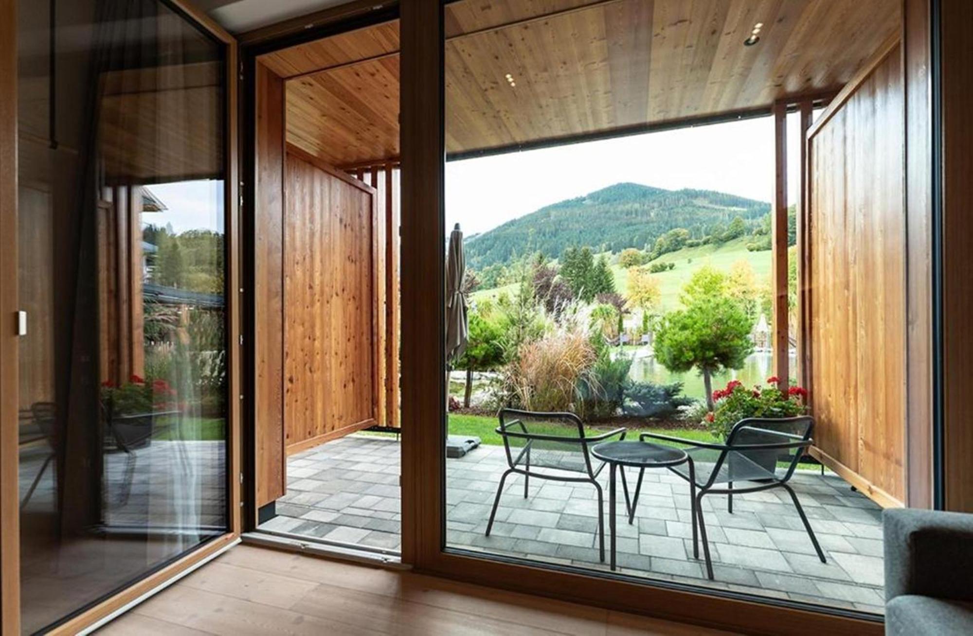 Hotel Wellness Und Brunch Morgenzeit Beheizter Naturpool Mit Sandstrand Genuss Fruehstueck Bis 13 Uhr Hochkoenig Sommercard Maria Alm am Steinernen Meer